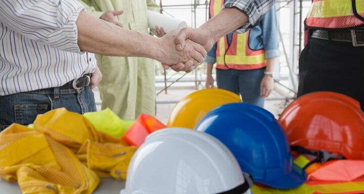 People in a group wearing hardhats