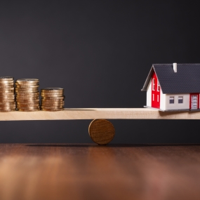 House Coins on Scale