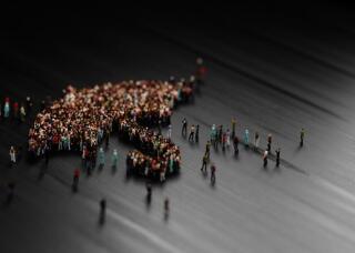 Human Crowd Forming An Umbrella Symbol