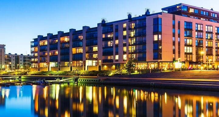 Modern apartment building overlooking a lake