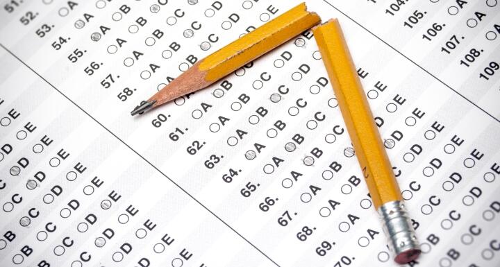 A bubble answer sheet and a broken pencil