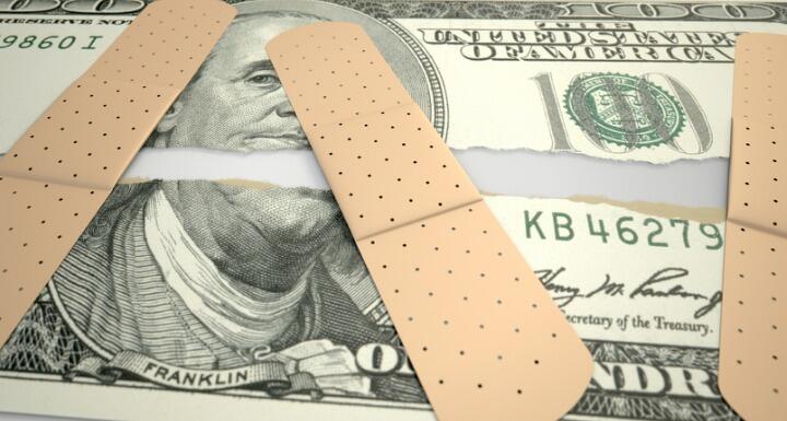 torn money bandaid